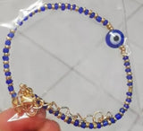 Evil Eye Protection Bracelet with Blue, Gold & White Beads